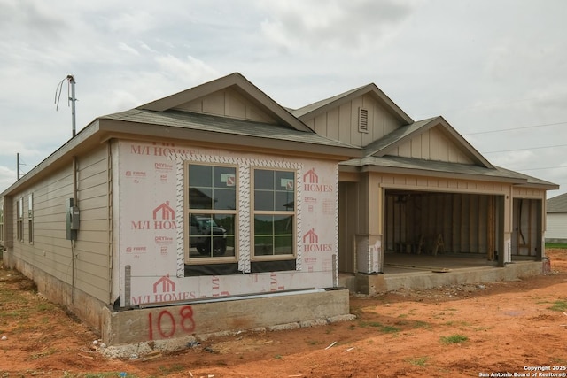 view of home's exterior featuring a garage and board and batten siding