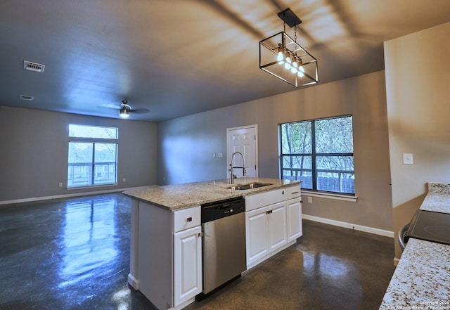 kitchen with visible vents, baseboards, appliances with stainless steel finishes, white cabinetry, and a sink