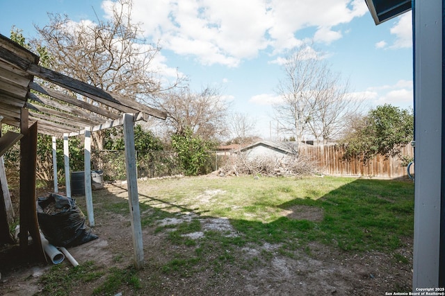 view of yard with a fenced backyard and a pergola