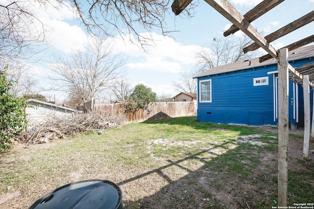 view of yard with fence