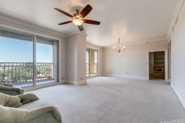 living room with light carpet, crown molding, baseboards, and ceiling fan with notable chandelier