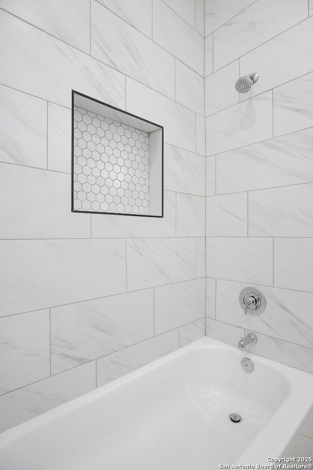 bathroom featuring shower / tub combination