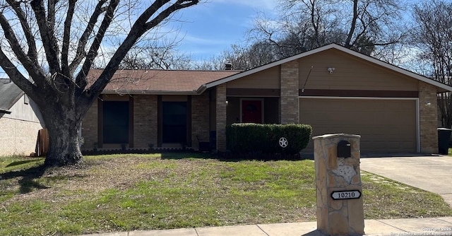 ranch-style house with a garage, a front lawn, concrete driveway, and brick siding