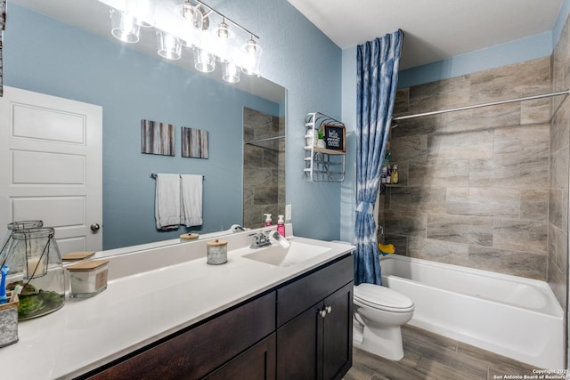 bathroom with toilet, shower / bath combo, wood finished floors, and vanity