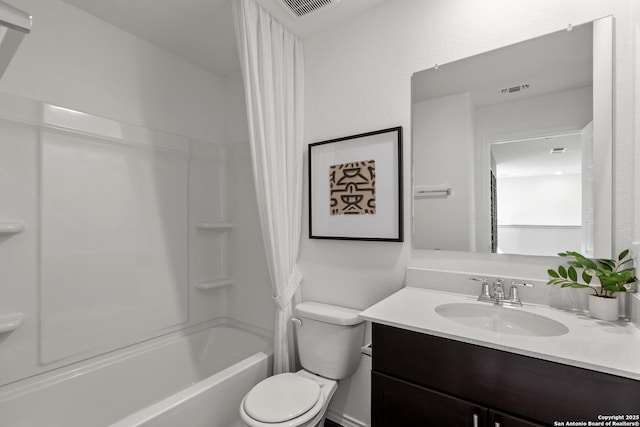 full bathroom with  shower combination, visible vents, vanity, and toilet