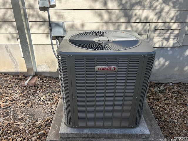 exterior details featuring cooling unit