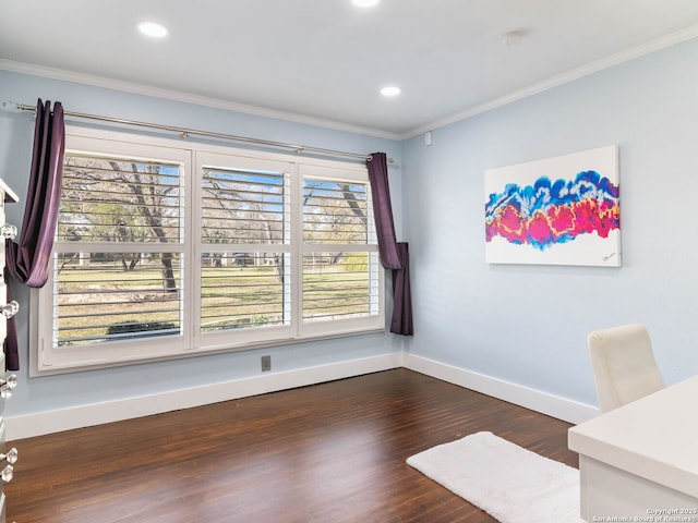 office space featuring crown molding, baseboards, and dark wood-style flooring