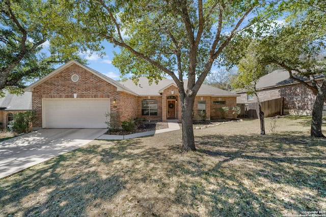 ranch-style house featuring a garage, brick siding, concrete driveway, fence, and a front yard