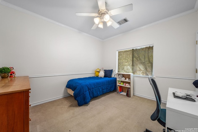 carpeted bedroom with ceiling fan, baseboards, visible vents, and crown molding