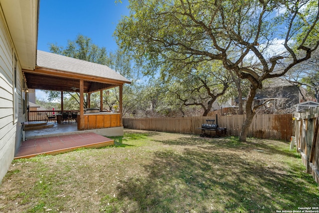 view of yard featuring a fenced backyard and a patio