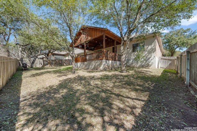 view of yard with a fenced backyard