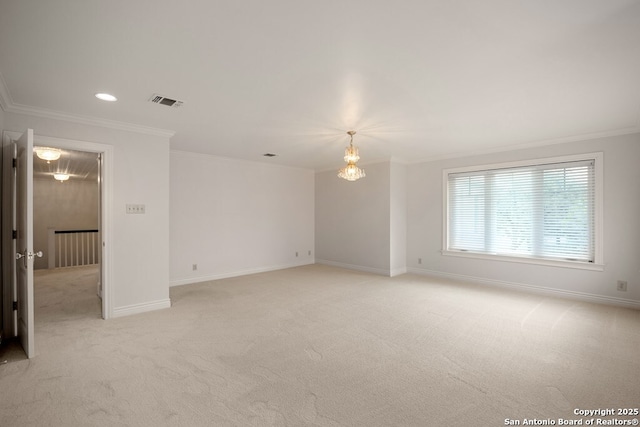 unfurnished room with recessed lighting, light colored carpet, visible vents, ornamental molding, and baseboards