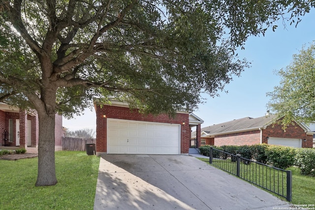 view of front of home featuring concrete driveway, fence, cooling unit, a front lawn, and brick siding