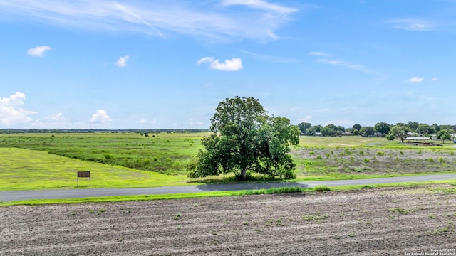 exterior space with a rural view