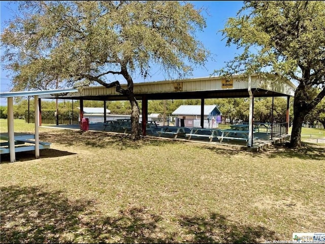 view of community featuring a yard