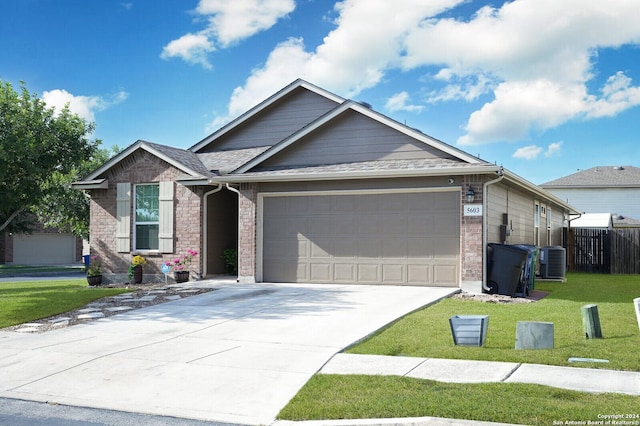 single story home with an attached garage, cooling unit, fence, driveway, and a front lawn