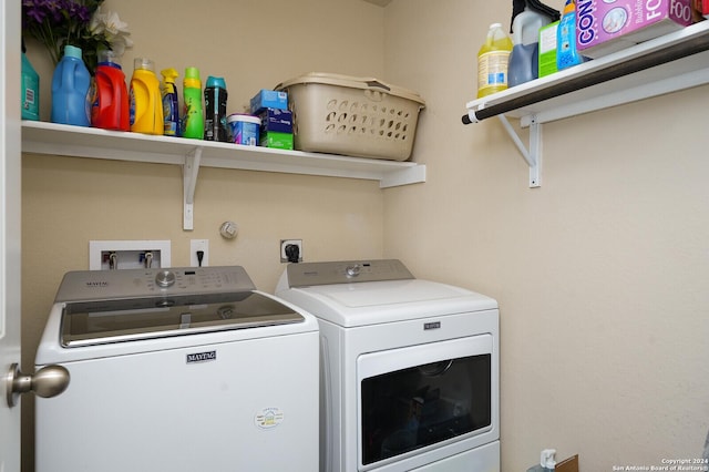 washroom with laundry area and washing machine and clothes dryer