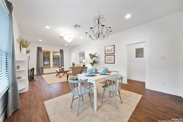 dining area with recessed lighting, visible vents, baseboards, dark wood-style floors, and an inviting chandelier