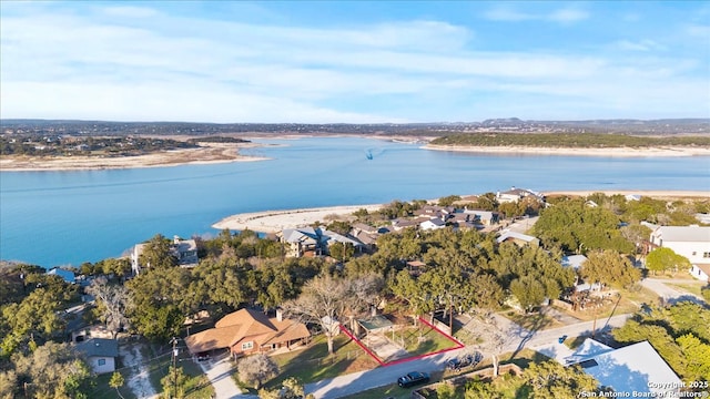 drone / aerial view with a water view