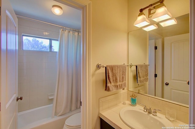 full bath featuring toilet, shower / bath combination with curtain, and vanity