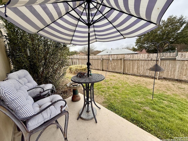 view of patio with fence