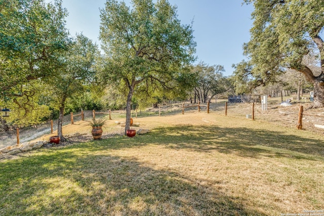 view of yard featuring fence