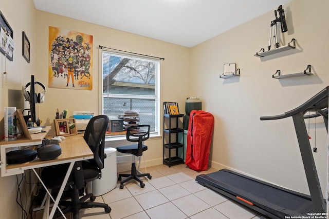 home office featuring light tile patterned floors and baseboards