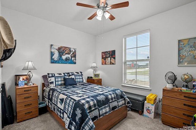 bedroom with carpet floors and a ceiling fan