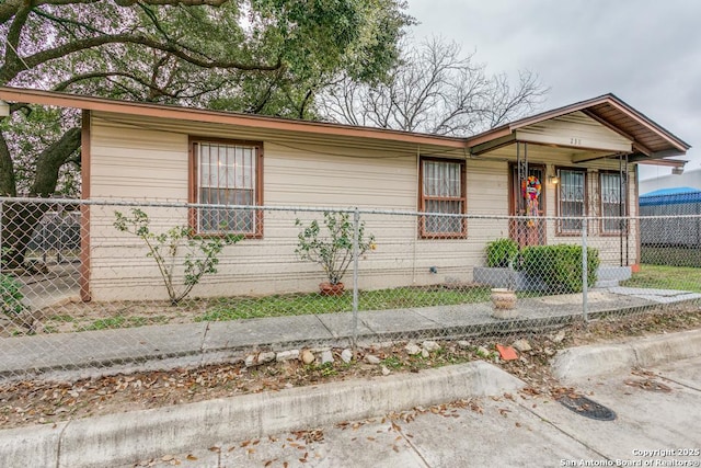 view of front of home with fence