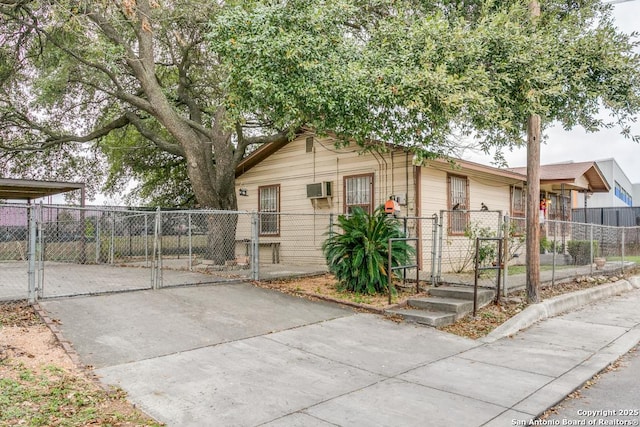 view of front of house with a gate and fence