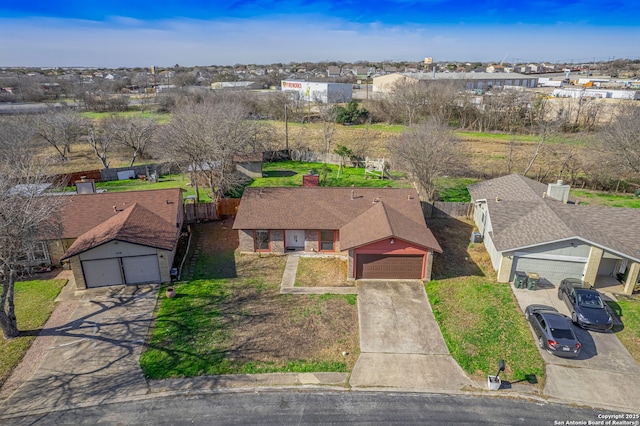 birds eye view of property with a residential view