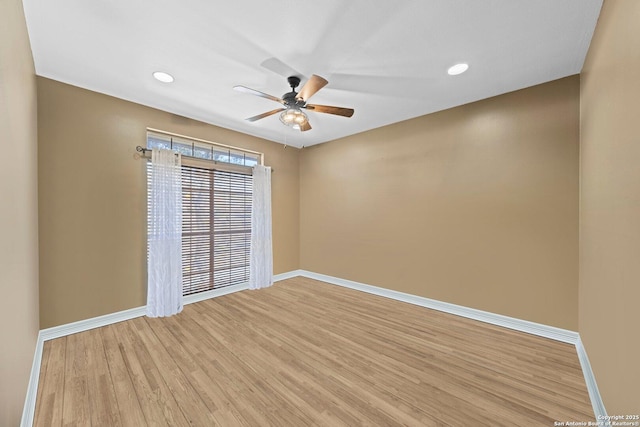 unfurnished room featuring a ceiling fan, recessed lighting, light wood finished floors, and baseboards