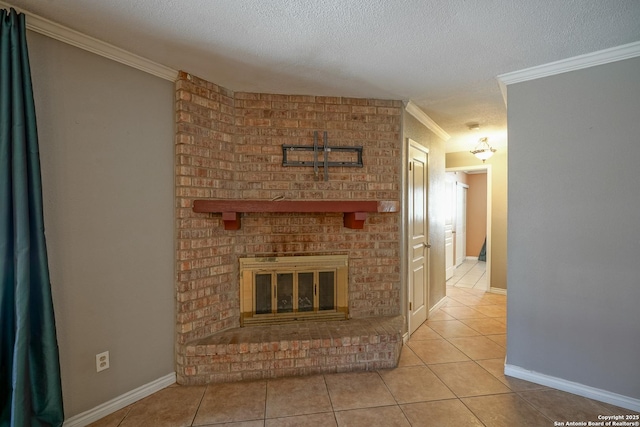 unfurnished living room with light tile patterned floors, baseboards, a textured ceiling, crown molding, and a fireplace