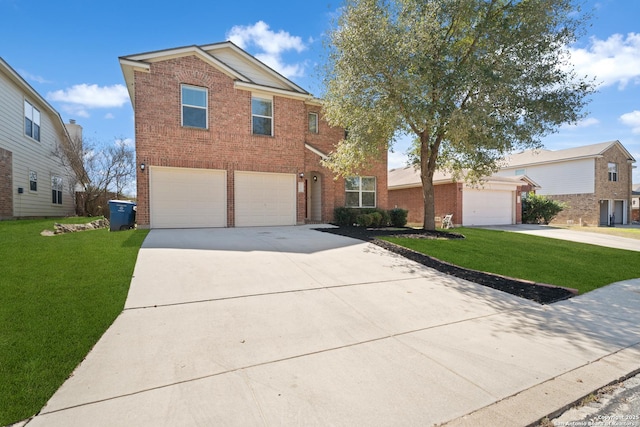 traditional-style home featuring a garage, concrete driveway, brick siding, and a front yard