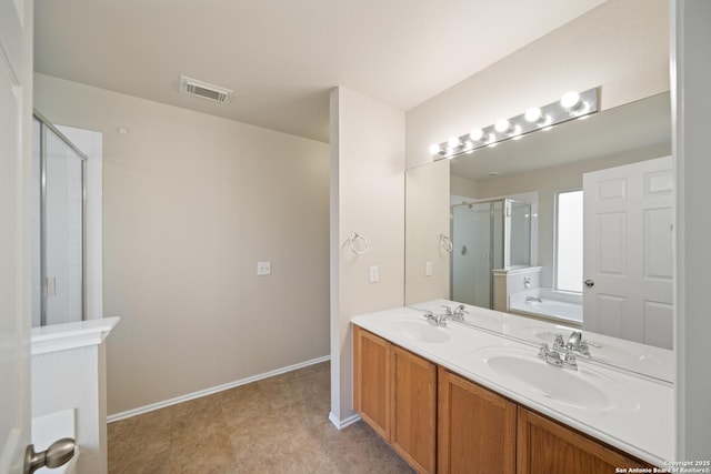 full bath featuring double vanity, visible vents, a sink, a shower stall, and a bath