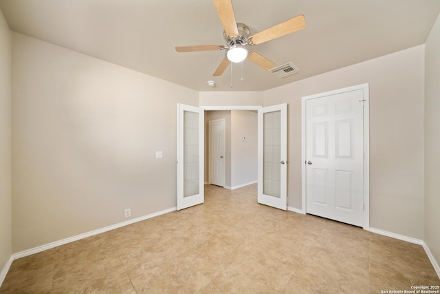 unfurnished bedroom featuring ceiling fan, french doors, visible vents, and baseboards