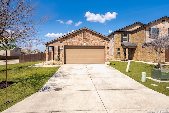 traditional-style home featuring brick siding, an attached garage, a front yard, fence, and driveway