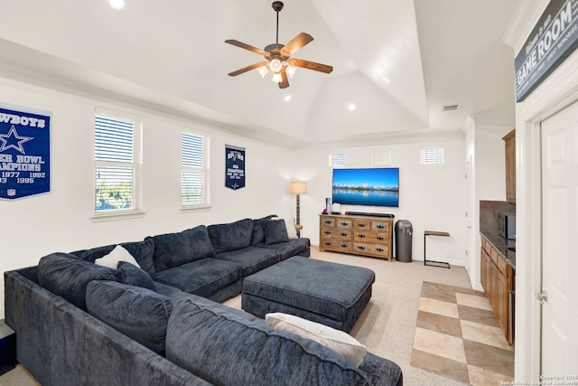 living area with ceiling fan, lofted ceiling, visible vents, and recessed lighting