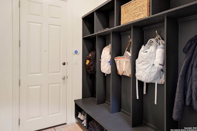 mudroom with light tile patterned floors