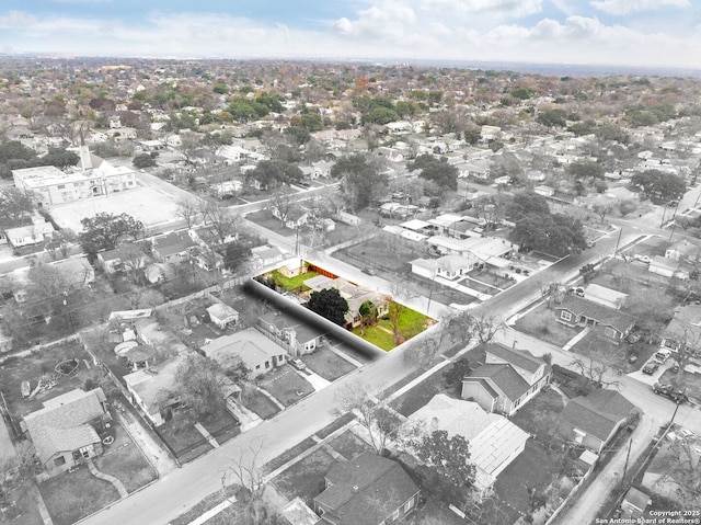 birds eye view of property with a residential view