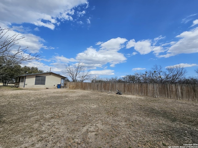 view of yard featuring fence