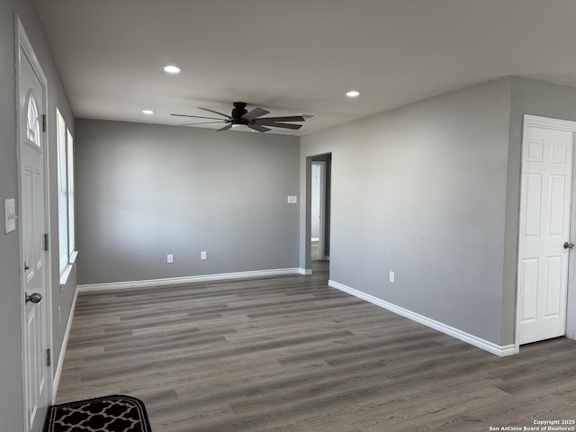 empty room featuring recessed lighting, ceiling fan, baseboards, and wood finished floors