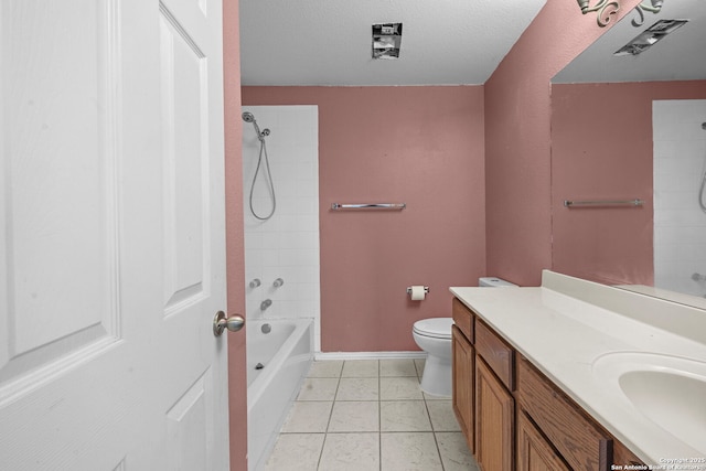 full bath featuring baseboards, toilet, vanity, tile patterned floors, and shower / bathtub combination