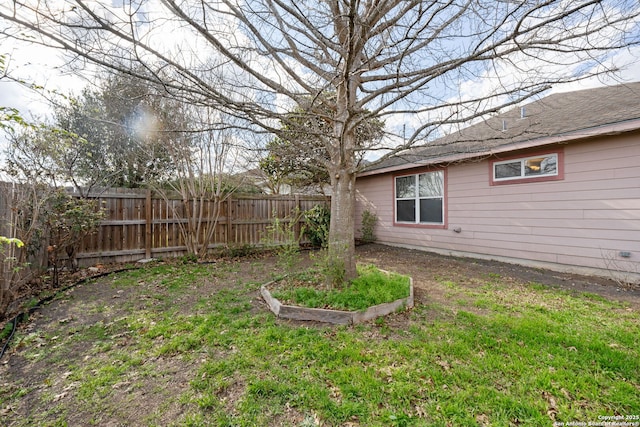 view of yard featuring fence