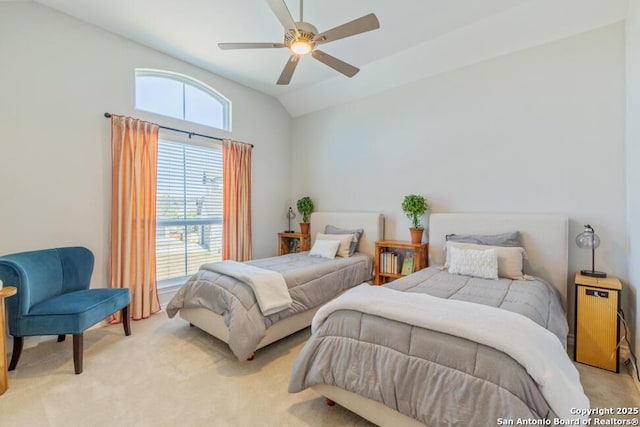 bedroom with light carpet, a ceiling fan, and lofted ceiling