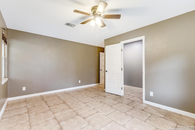 unfurnished bedroom featuring baseboards, visible vents, and a ceiling fan