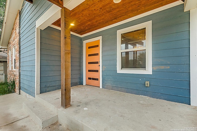 entrance to property with covered porch