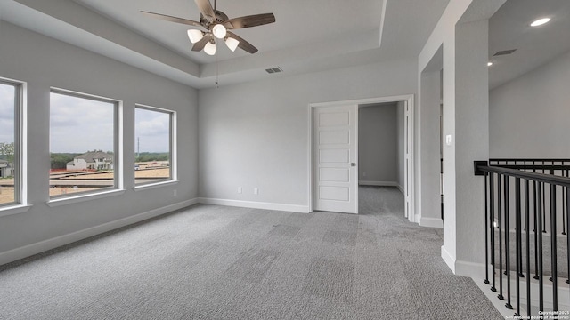 417 Verdad Way, Boerne, TX 78006 - unfurnished room featuring carpet flooring, ceiling fan, baseboards, a raised ceiling, and recessed lighting