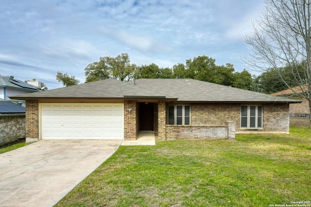 ranch-style home with a garage, driveway, brick siding, and a front yard