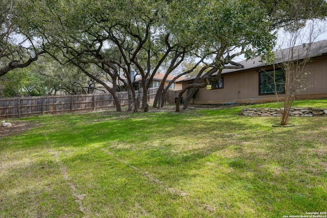 view of yard featuring fence